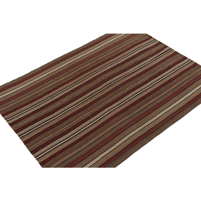 This vintage 6x8 Persian Kilim is believed to be a mid-century Palas flat weave of Bidjar origin—handwoven in wool circa...