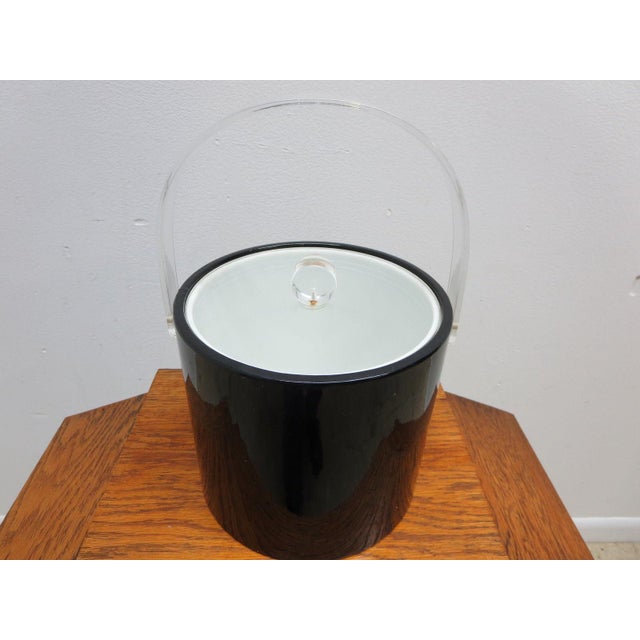 Nice shape tight and sturdy. Some scratches and wear on lid.. Small crack near handle.. Does not affect in any way......