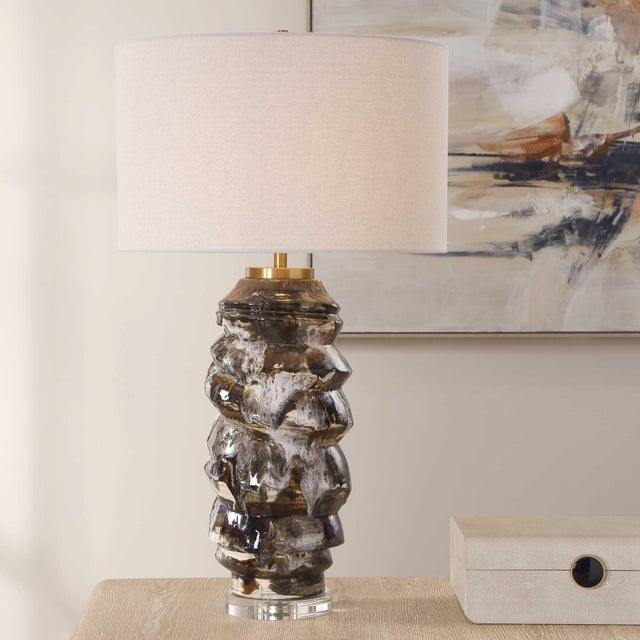 This Artistic Table Lamp Boasts A Unique Ceramic Base With A Textured Drip Glaze In Various Shades Of Chocolates Browns...