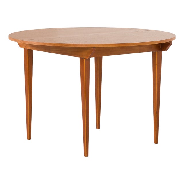 Scandinavian Round Teak Table with Hidden Extension, 1970s For Sale