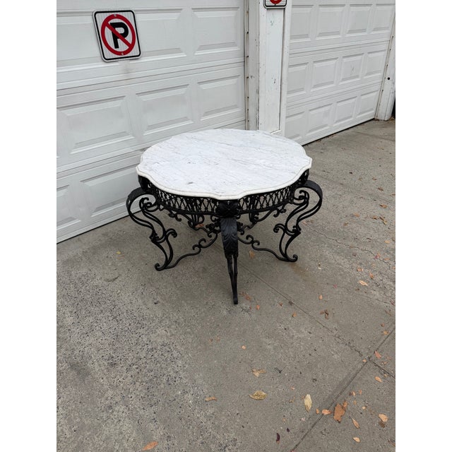 We have an absolutely gorgeous vintage Victorian Revival marble top center table for sale. This grand French Baroque...