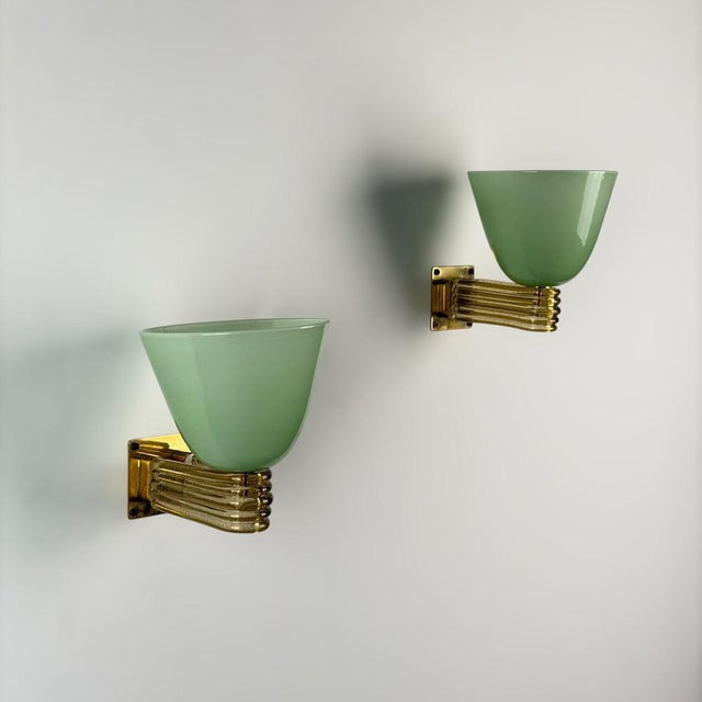 An exceptionally elegant and scarce pair of wall sconces designed by Tomaso Buzzi for Venini, produced in Murano during...
