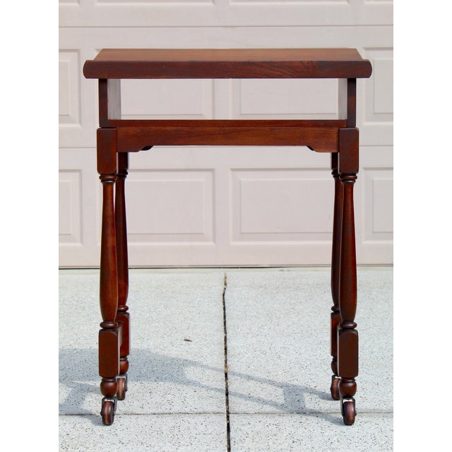 Striking Antique Colonial Revival walnut lectern, likely made circa 1910 - 1925 in the United States, featuring classic...