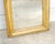 Beautiful antique rectangular mirror in giltwood, dating from the 1930s. The frame features classic moldings and retains...