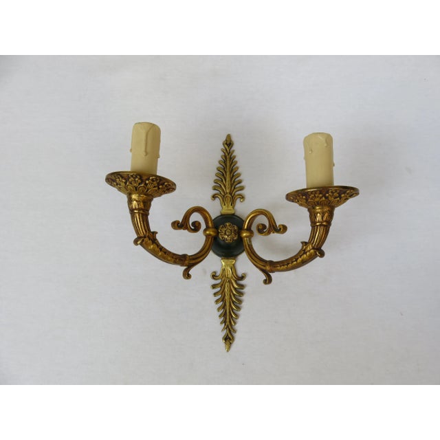 High quality and finely crafted pair of wall lights in Empire style. Very classy is the combination of rich Goldtons with...