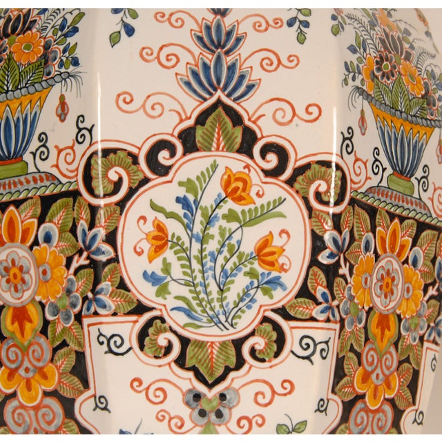 Delft Vases with cover tall floor vases. Dutch tinglazed pottery polychrome decor. The set consist of 2 tall vases with...