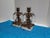 Lovely pair Hollywood Regency style candle holders / candlesticks. Having single candle holder with seven arms that have...