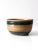 A vintage studio pottery bowl with a beautifully tactile, handcrafted presence. The softly rounded form is finished in a...