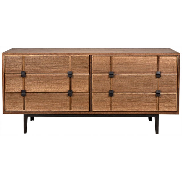 Simple linear carvings are all the embellishment this transitional sideboard requires. Carved of walnut with a hand-...
