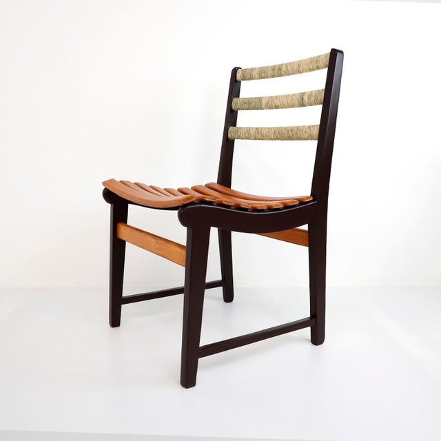 We offer this original Set of Six Chairs by Michael Van Beuren for Domus in pine wood and with the characteristic...