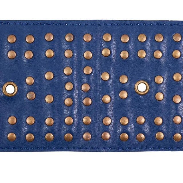 With its refined, geometric pattern articulated in brass rivets, this embellished leather trim adds a sophisticated and...