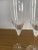 A beautiful set of five Orrefors Prelude champagne flutes, hand‑blown in Sweden and featuring the pattern’s signature...