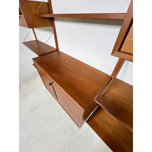 Wood C. 1960s Torbjorn Afdal Three-Bay Teak Wall Mounted Shelving Unit For Sale - Image 7 of 9