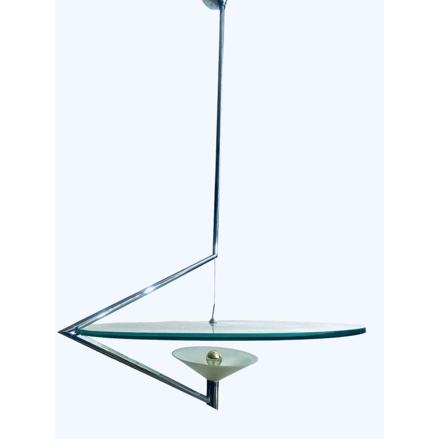 Disc made of polished sandblasted crystal glass with clear edge, shade made of white opal glass, chromed tubular brass...