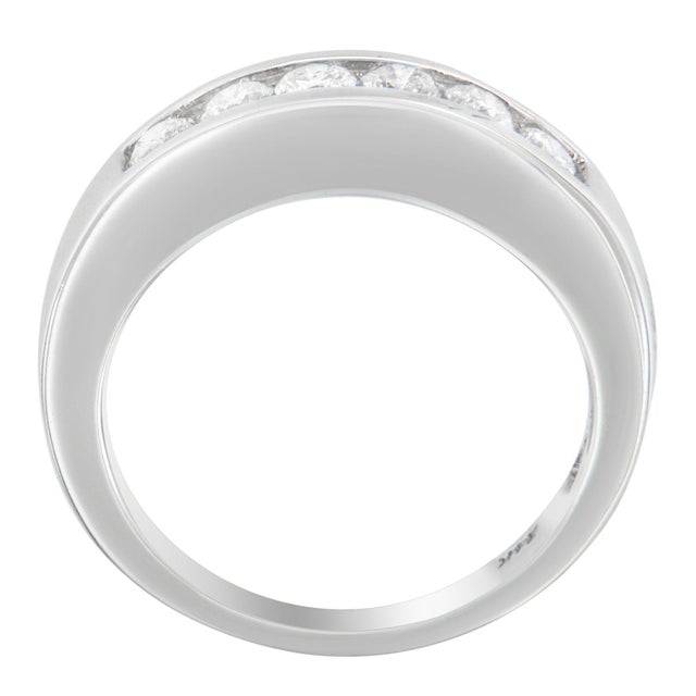 Bring more sophistication and style to your party look with this wonderful diamond band. Crafted out of 14k white gold,...