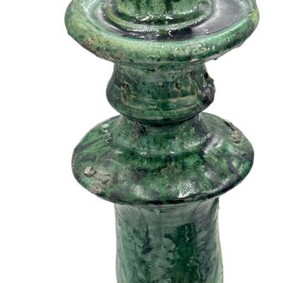 A Moroccan Tamegroute glazed candlestick holder is a handcrafted piece made in the historic pottery village of Tamegroute...