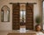 Antique Indian Carved Teakwood and Iron Door, the top with a shaped arch, with a carved outline and center style. A very...