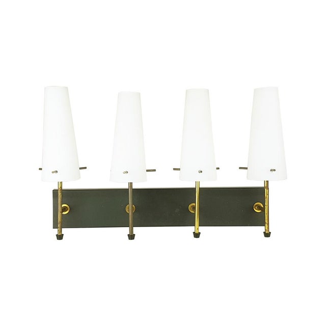 Set of 5 wall lamps made in Italy in the 1950s. Each lamp is equipped with 4 lamp holders with relative sandblasted glass...