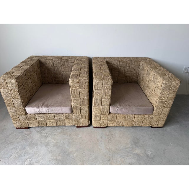 Striking pair of vintage coastal lounge chairs in the style of Adrien Audoux and Frida Minnet, featuring an eye-catching...