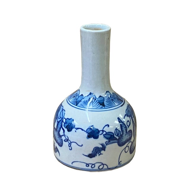 This is a handmade Chinese blue and white porcelain small vase. The surface is handpainted with precise oriental scenery...