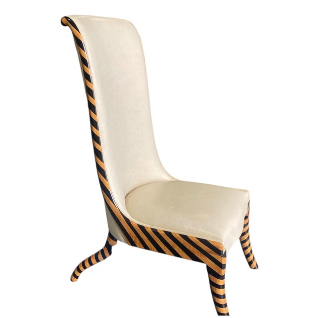 Gorgeous statement chair from the desirable Rose Tarlow. The Grisaille chair is handmade from pecan and ebonized wood, and...
