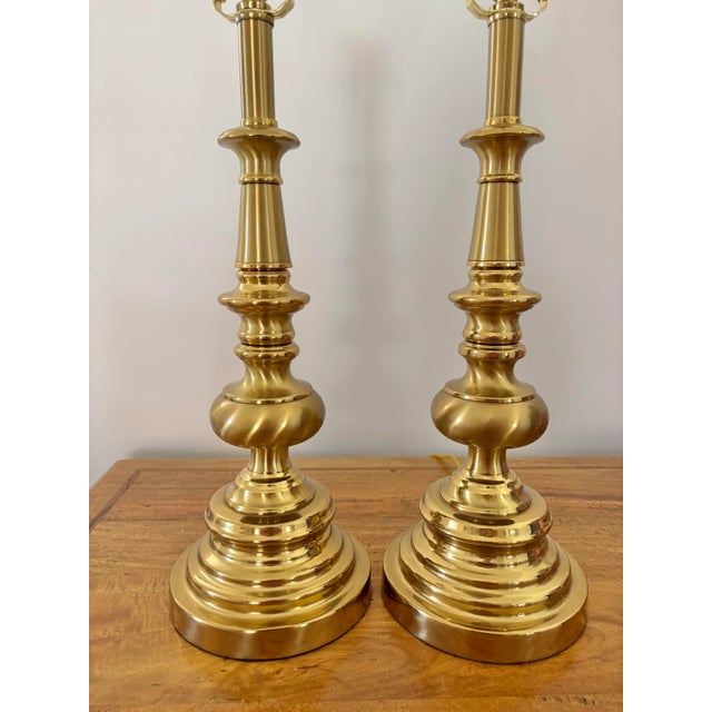 Solid brass Regency style table lamp pair, made by Stiffel. Bright and heavy brass. Approx. 20 years old and in excellent...