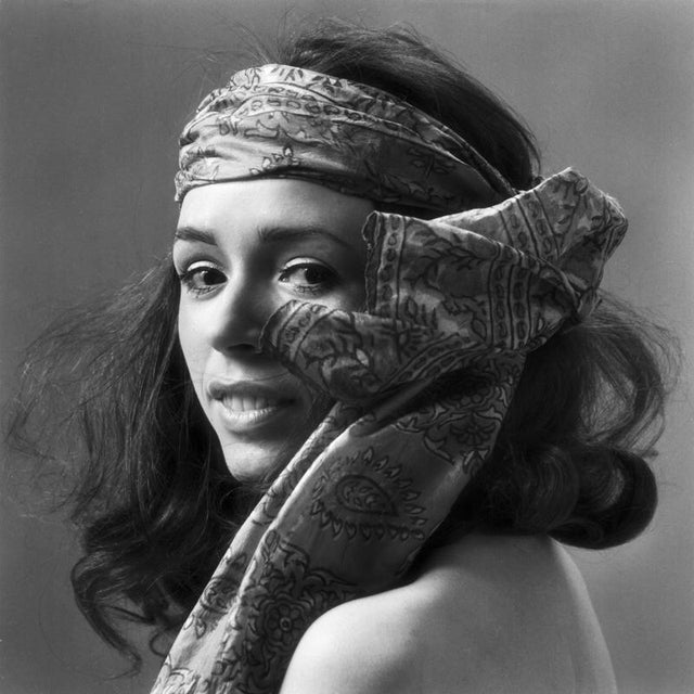 A striking black-and-white studio portrait by klaus redenbacher captures the essence of late 1960s counterculture. The...