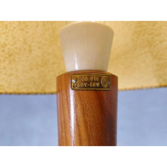 Mid-century table lamp from 1960s czechoslovakia, designed in the style of uluv. This piece features a solid maple wood...