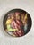 The plate is in excellent condition, completely intact, with no cracks or chips. This piece has an attribution mark, I am...