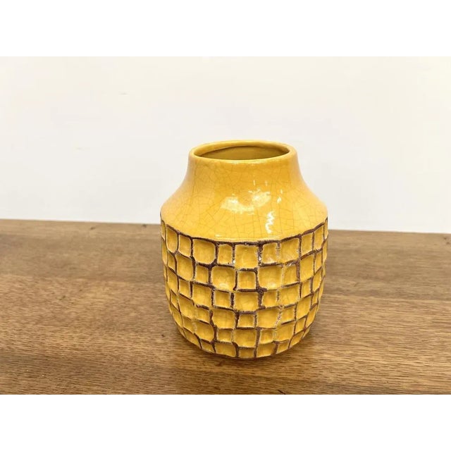Superb decorative piece in bright yellow glazed earthenware, characteristic of the work of the vallauris workshops in the...