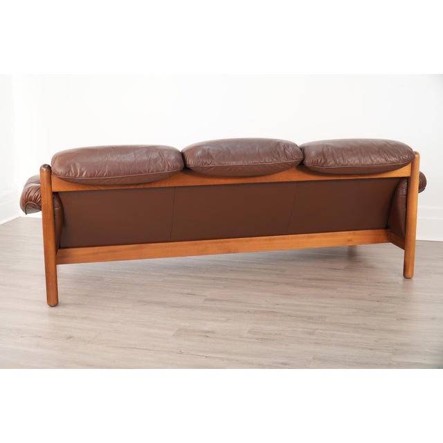 Manufactured by Ulferts in Sweden during the 1970s, this Scandinavian Modern "Drabant" three-seat sofa features rich brown...