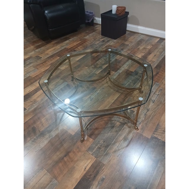 Brass and glass coffee table, unsigned and unmarked. Ubiquitous design attributed to LaBarge. Hexagonal 3/3" tempered...