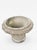 This charming vintage cast stone planter features an intricate, high-relief basket weave pattern across the body. The...