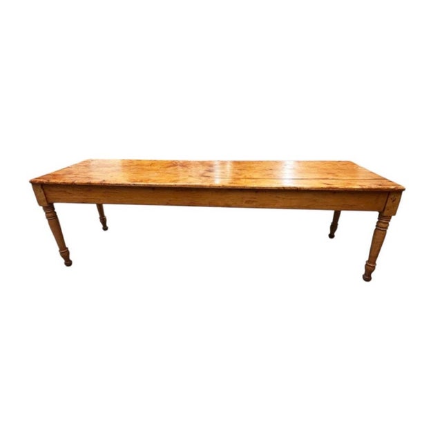 Rare Extended Length 19th Century Pine Farmhouse Work Table. Table features solid wood construction, a substantial hand-...