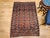 3’ 8” x 5’ 3” Vintage Turkmen Tekke area rug in an allover small medallion pattern from the early 1900s. The rug has a...