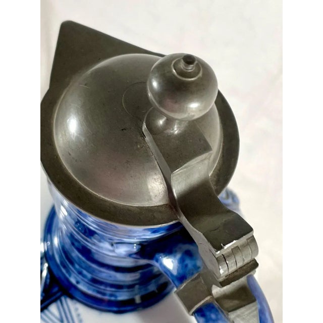 Antique German KPM Porcelain Lidded Bartmann Jug Tankard. 19th century German Bellarmine Bartmann jug with bearded man...