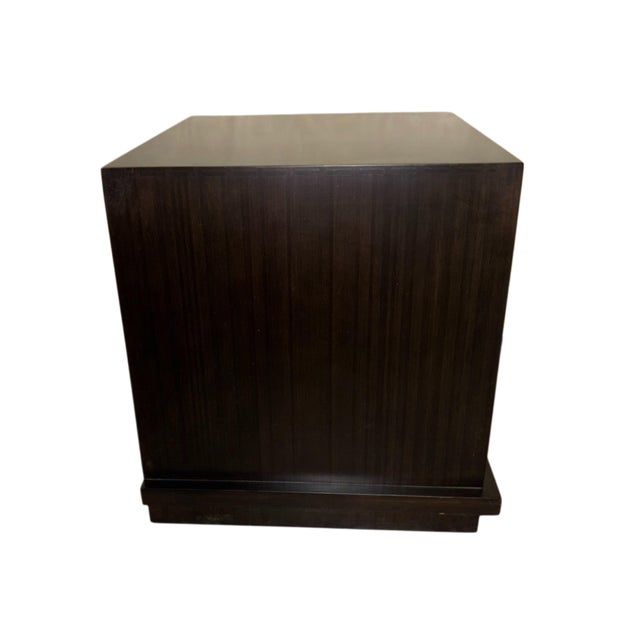 The sleek surfaces and clean lines of this handcrafted nightstand show off the rich gleam of the bamboo wood to...