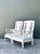 Elevate your seating arrangement with this exquisite pair of vintage white lacquered lounge chairs, a masterclass in...
