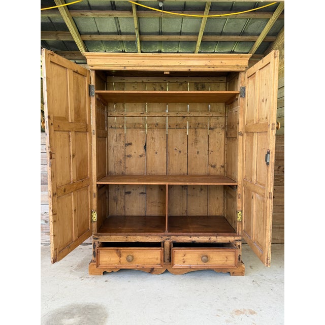 A substantial 19th-century English pine cupboard or wardrobe with beautifully aged character and impressive scale....