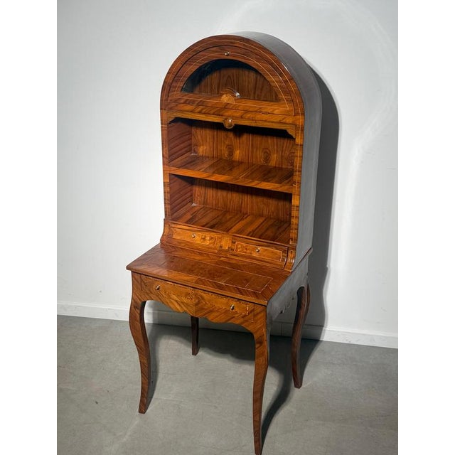 Elegant antique English writing desk / secretary , beautifully executed in richly figured wood veneer with intricate...
