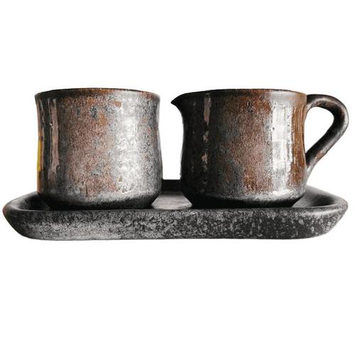 Vintage Arabia Finland ‘Ruska’ cream set consisting of a milk jug, sugar bowl, and tray from the 1960s. This timeless...