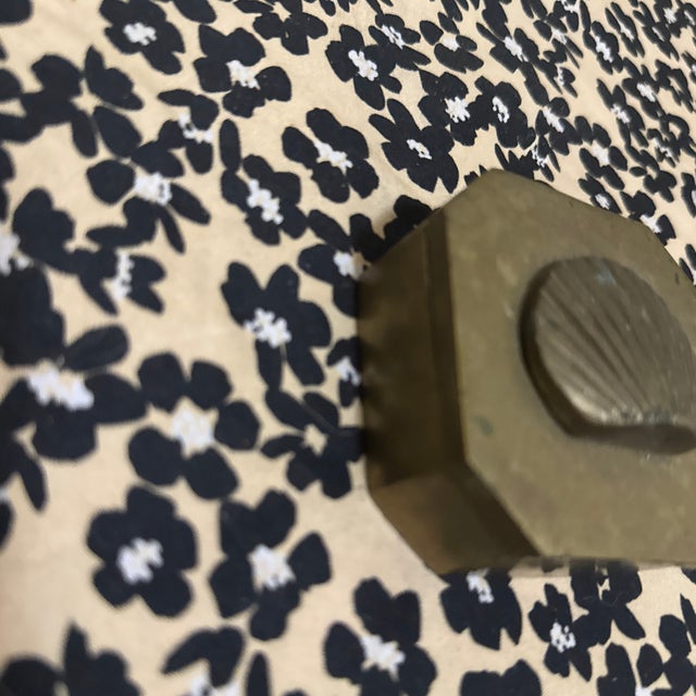 Elevate your décor with this charming brass trinket box, featuring a bras shell on top. Compact yet striking, this piece...