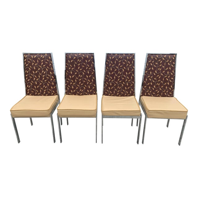 Set of four vintage chrome dining chairs with vinyl upholstery, floral design. Chrome is in good, vintage condition and -...