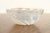 A gorgeous Art Deco period glass bowl featuring a beautifully molded opalescent concentric wave design By René Lalique...