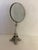 Add a touch of Parisian flair to your workspace or library shelves with this unique tabletop magnifying glass. Serving as...