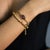 Early 21st Century Regal Essence Gold Adjustable Bracelet For Sale - Image 5 of 8