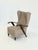 This iconic armchair by Melchiorre Bega is a beautiful example of refined Italian design. The elegant, high backrest,...