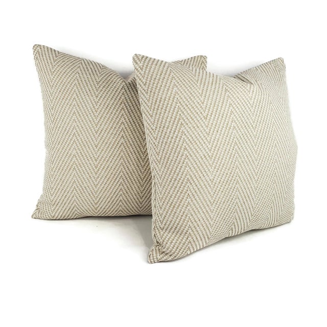 From Kravet is Bow Herringbone in the color Sand pillow cover. This fabric is made from 100% polyolefin which is water...