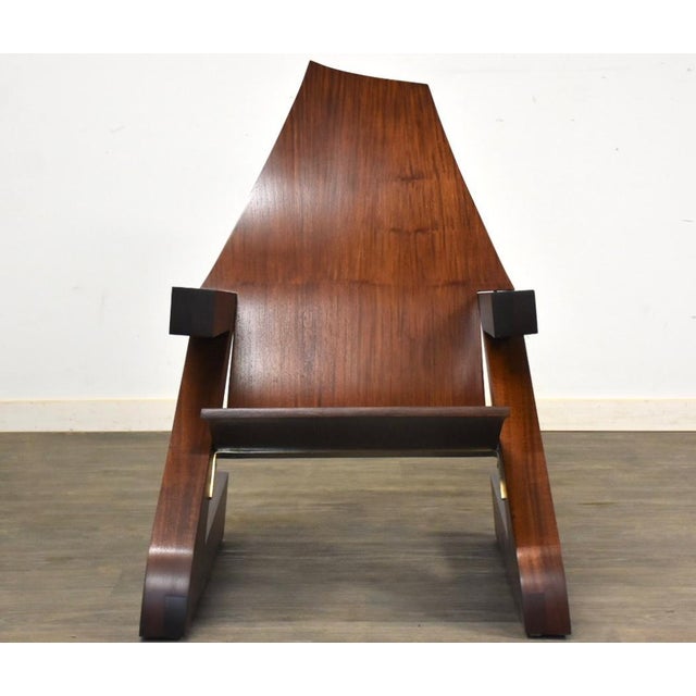 A mid century modern mahogany bent wood Z lounge chair with block chunk mahogany frame. A slight inward canted frame and...