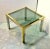Solid brass low table,1960s. Made in Italy. Green fumè glass. Bicolor brass and chromed. Very good condition. Maker unknown.